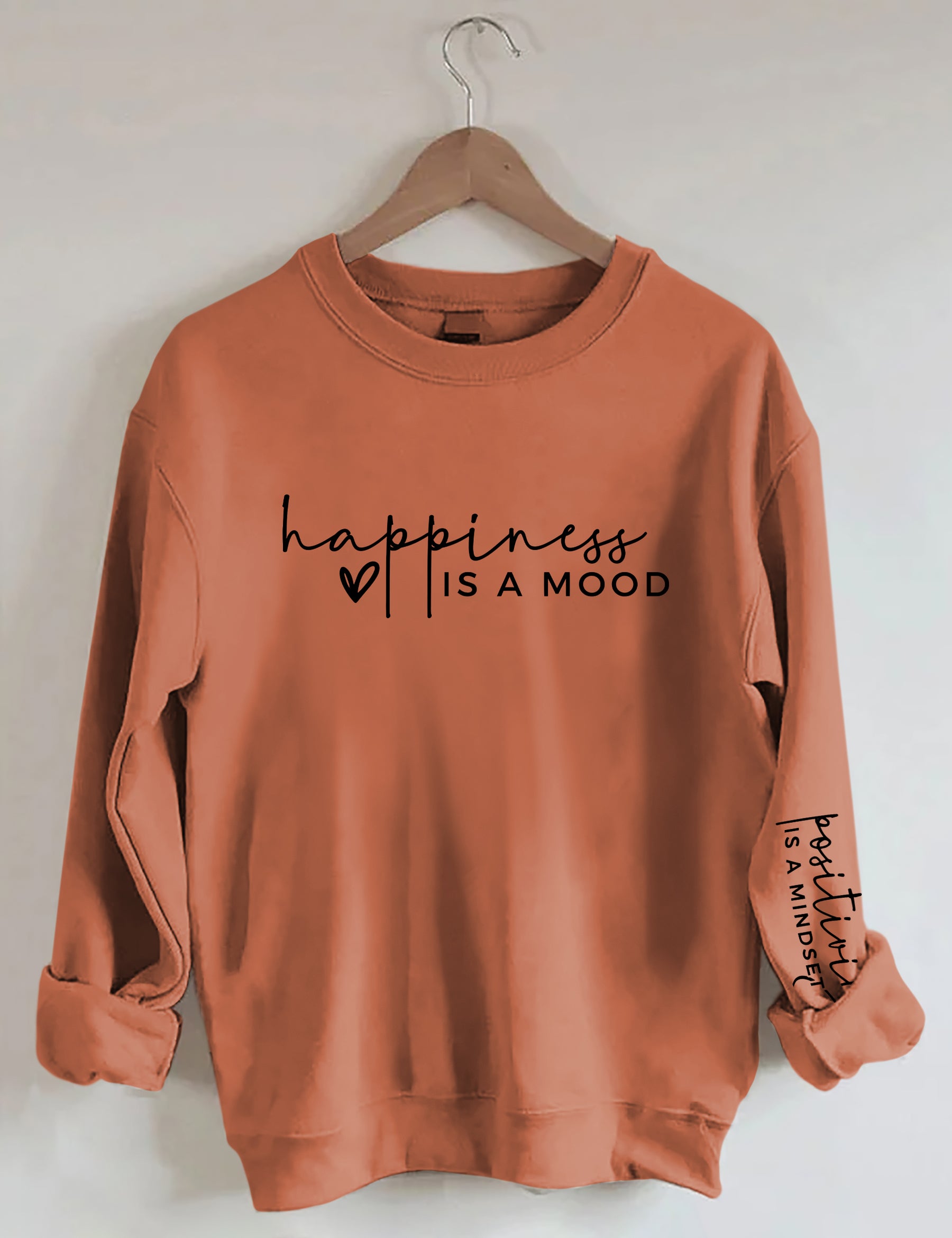 Le bonheur est une humeur, la positivité est un sweat-shirt d’état d’esprit