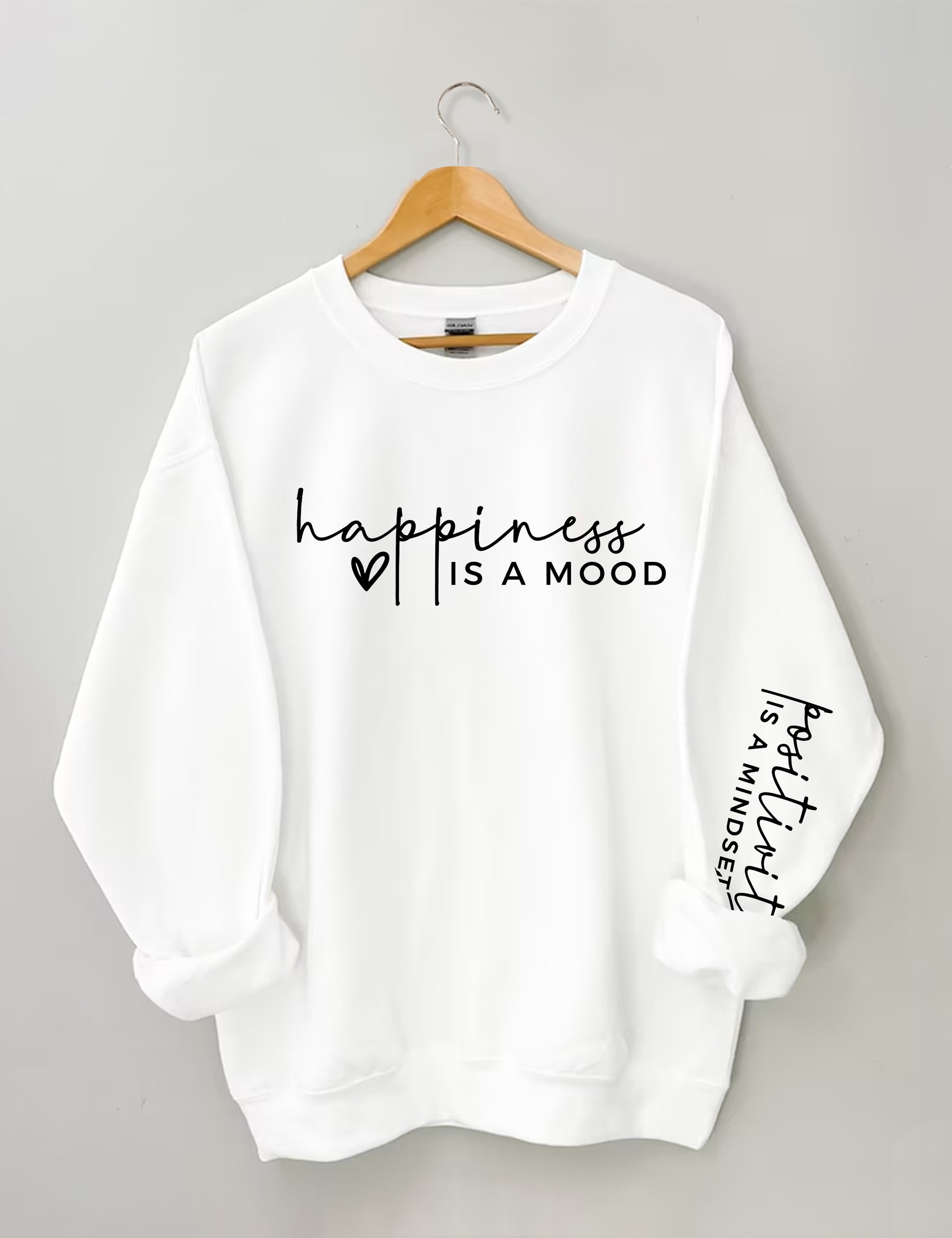 Le bonheur est une humeur, la positivité est un sweat-shirt d’état d’esprit