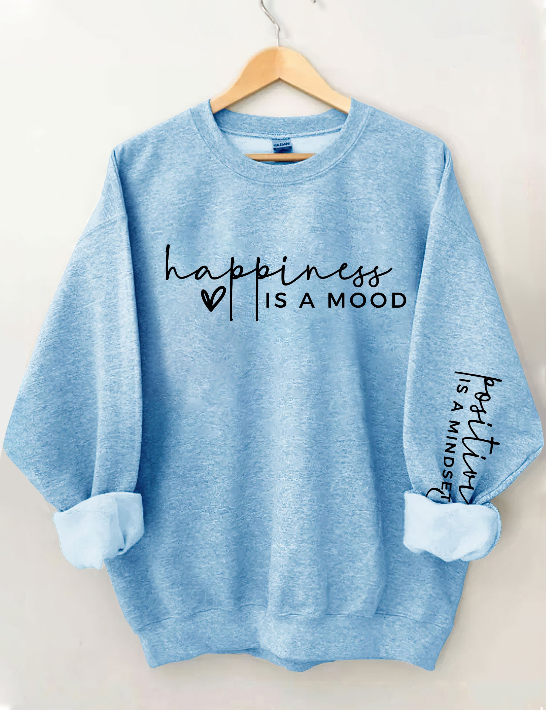 Le bonheur est une humeur, la positivité est un sweat-shirt d’état d’esprit