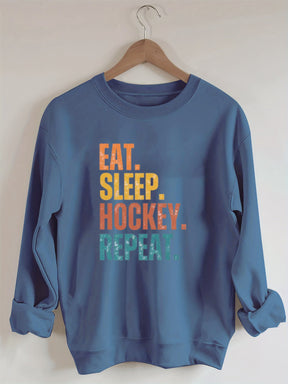Eat Sleep Hockey Repeat Sweatshirt