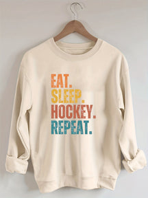 Eat Sleep Hockey Repeat Sweatshirt