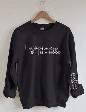 Le bonheur est une humeur, la positivité est un sweat-shirt d’état d’esprit