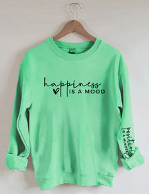 Le bonheur est une humeur, la positivité est un sweat-shirt d’état d’esprit