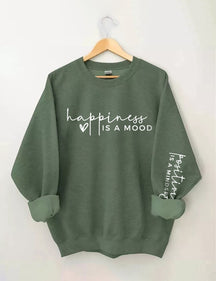 Le bonheur est une humeur, la positivité est un sweat-shirt d’état d’esprit