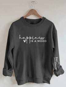 Le bonheur est une humeur, la positivité est un sweat-shirt d’état d’esprit