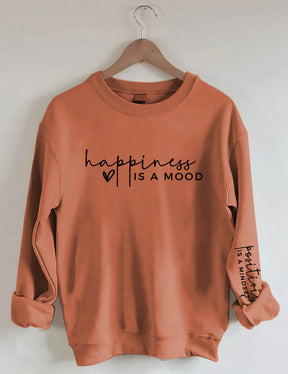 Le bonheur est une humeur, la positivité est un sweat-shirt d’état d’esprit