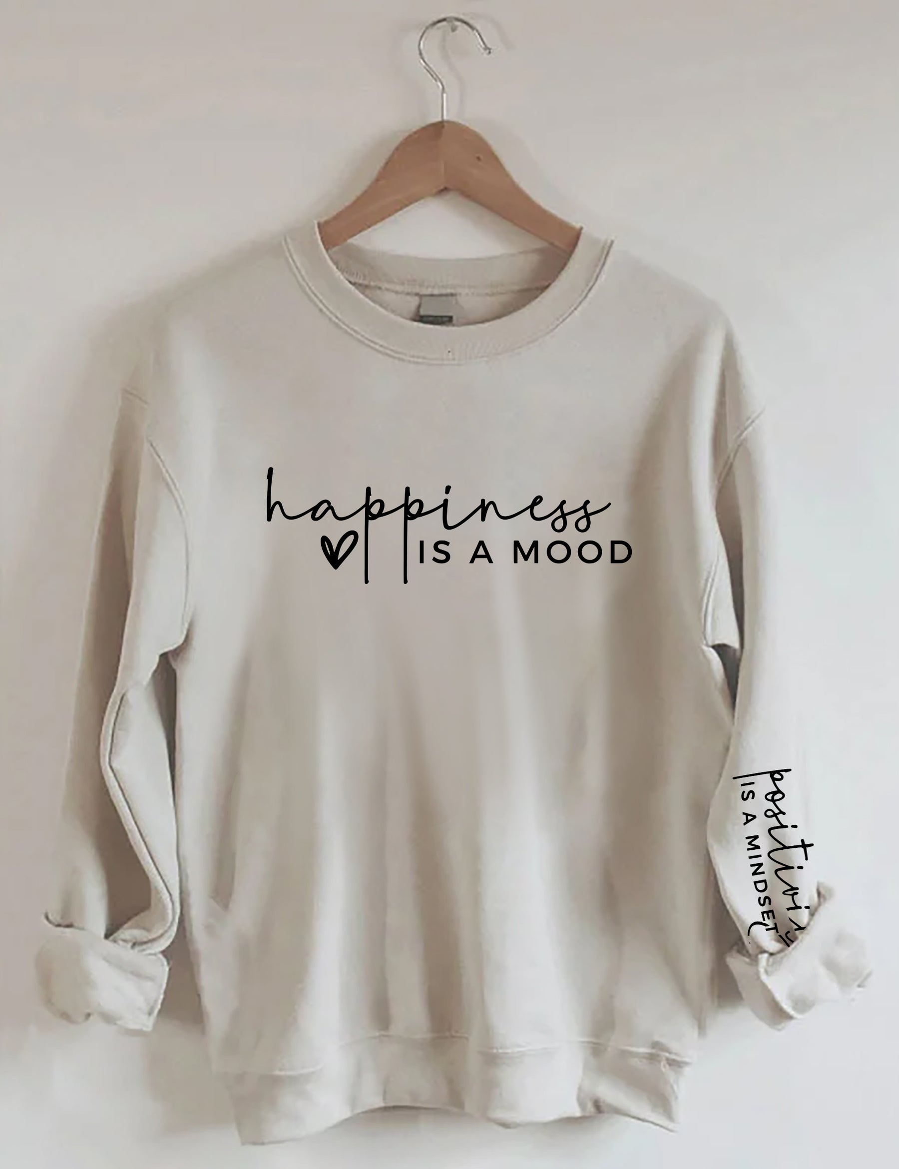 Le bonheur est une humeur, la positivité est un sweat-shirt d’état d’esprit
