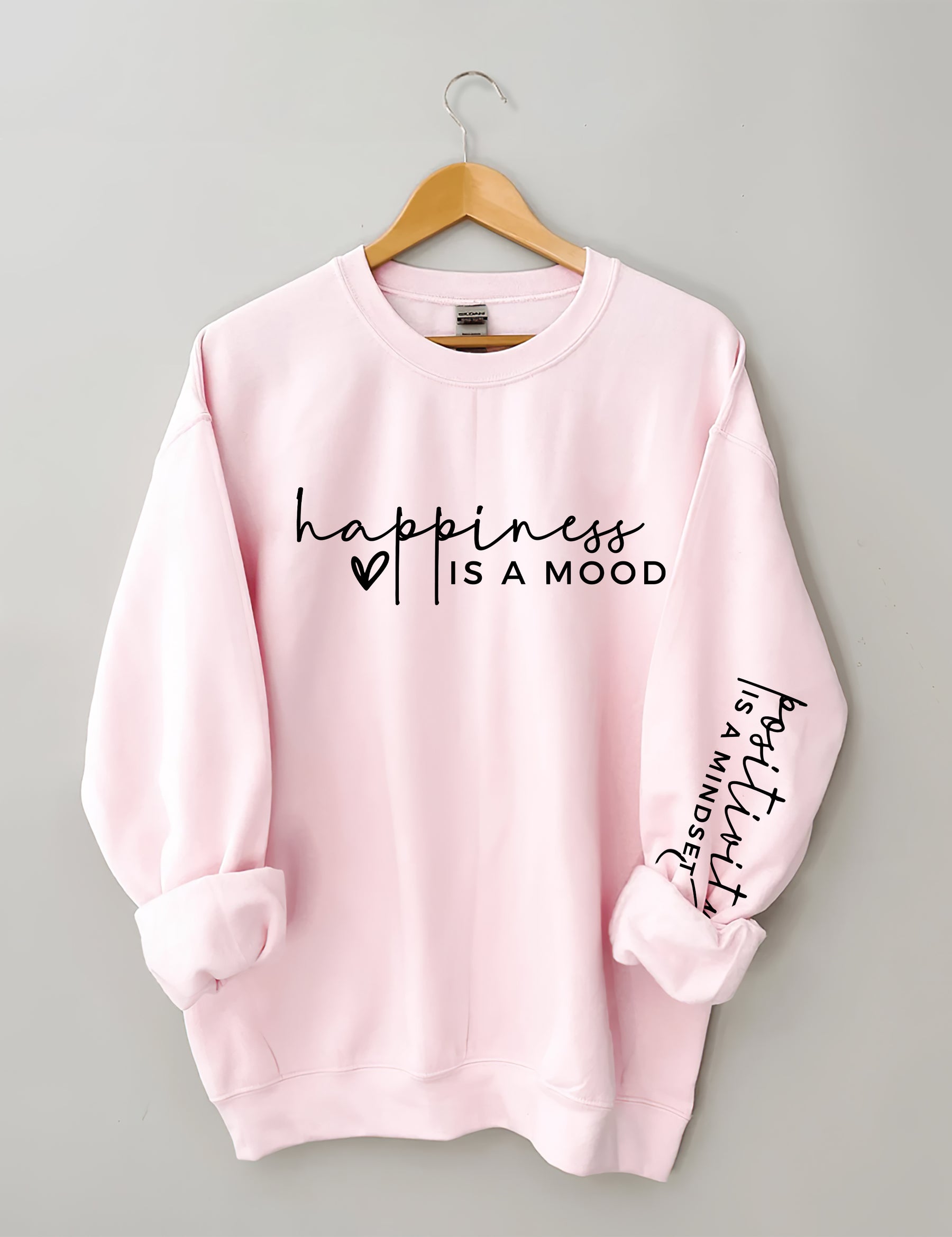 Le bonheur est une humeur, la positivité est un sweat-shirt d’état d’esprit