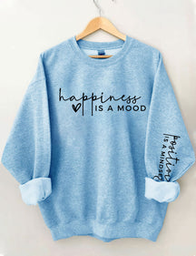 Le bonheur est une humeur, la positivité est un sweat-shirt d’état d’esprit